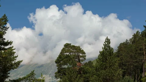 Movement of clouds and water flows in a stormy river in the mountains Video stock 87345731