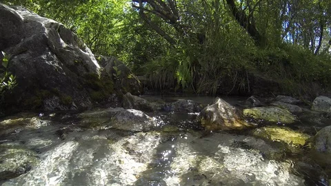 Movement of clouds and water flows in a stormy river in the Caucasus mountains Video stock 87535686