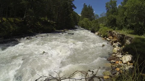 Movement of clouds and water flows in a stormy river in the Caucasus mountains Video stock 87536167