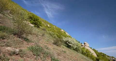 Movement of clouds and water flows in a stormy river in the Caucasus mountains Stock Footage 89842745