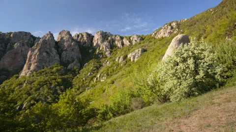 Movement of clouds and water flows in a stormy river in the Caucasus mountains Stock Footage 89843121