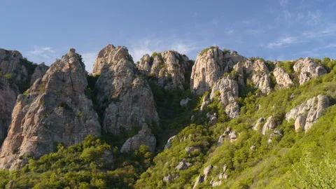 Movement of clouds and water flows in a stormy river in the Caucasus mountains Stock Footage 89846757