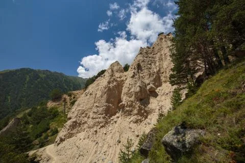 Movement of clouds and water flows in a stormy river in the Caucasus mountain Stock Photos