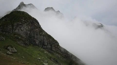 The movement of the clouds between two mountains 스톡 동영상 85391781