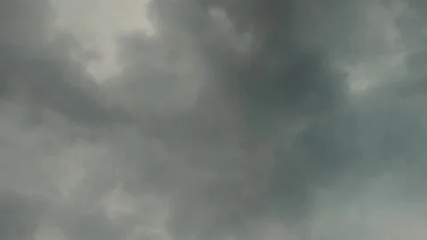 The movement of clouds in a black overcast sky before a heavy rain 動画素材 228944200