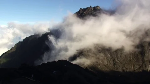 The movement of clouds in the mountains Stock Footage 69991007