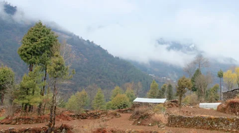 Movement of the clouds on the mountains Himalayas, Phakding village, Nepal Stock Footage 37211191