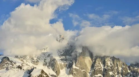 Movement of clouds over the Aiguille Verte at Alps / Time lapse in mountains Stock Footage 61819627