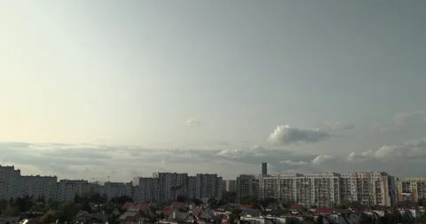 Movement of clouds over the city, block of flats. Timelapse. Stock Footage 252945095