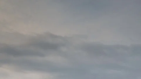 The movement of the clouds over the fields of winter wheat in spring in steppes Stock Footage 73937892