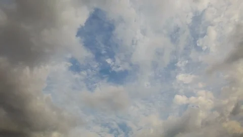 The movement of the clouds over the fields of winter wheat in spring in steppes Stock Footage 73938957
