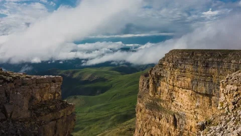 The movement of clouds over high cliffs. Stock Footage 156769074
