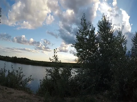 The movement of clouds over the lake Stock Footage 78157843