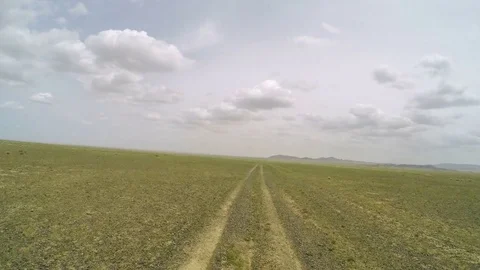 Movement of the clouds over the lake Khar-Us Nuur, Mongolia.  Video stock 77252103