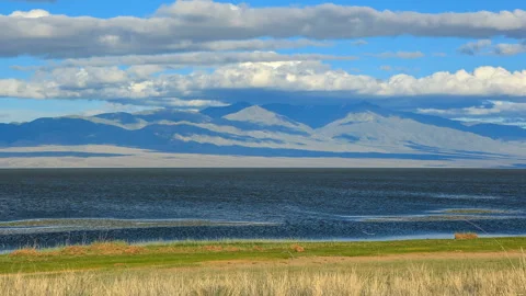 Movement of the clouds over the lake Khar-Us Nuur, Mongolia. Full HD Video stock 93229122