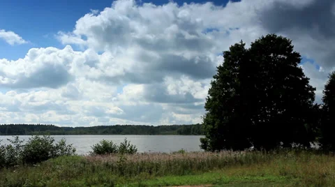 Movement of clouds over the lake Moiseevskoe, Stock Footage 29680359