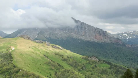 Movement of clouds over the mountain Aceshbok, Republic of Adygea, Russia FUL Stock Footage 105754199