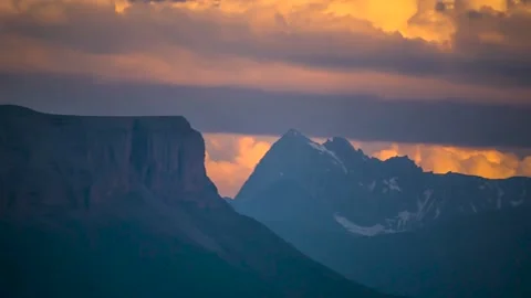 The movement of clouds over mountain cliffs Video stock 151425761