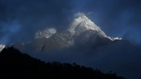 The movement of clouds over the mountain Kangtega Stock Footage 82359510