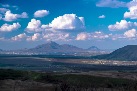 Movement of clouds over mountain peaks Stock Footage 306302221