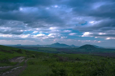 Movement of clouds over mountain peaks Stock Footage 306302340