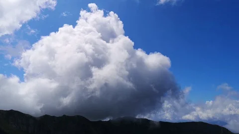 Movement of clouds over mountain tops Stock Footage 114984625