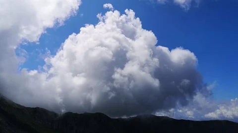 Movement of clouds over mountain tops Stock Footage 114984698