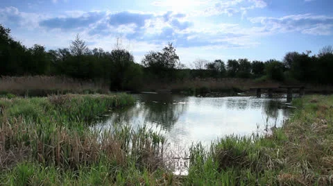 Movement of clouds over the river Black Stallion. Stock Footage 23542476