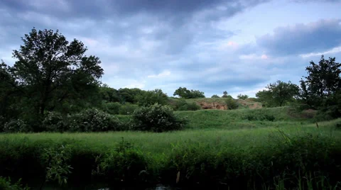 Movement of clouds over the river. Donetsk region, Ukraine  Stock Footage 33576405
