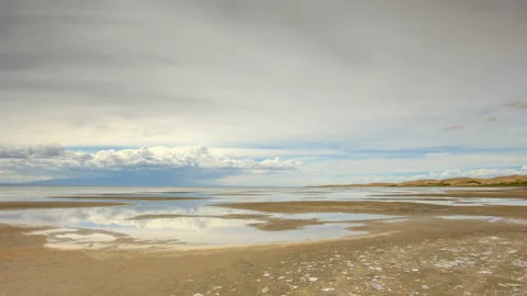 Movement of the clouds over the salted lake Durgun Nuur, Mongolia. Full HD Stock Footage 93293024