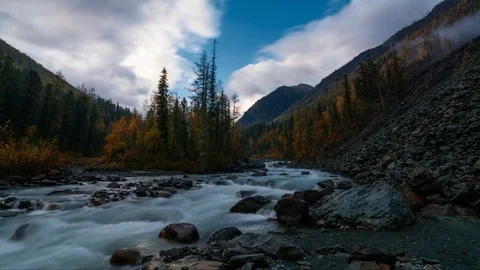 Movement of clouds over a small island in the mountainous river Akkem. Stock Footage 70187873
