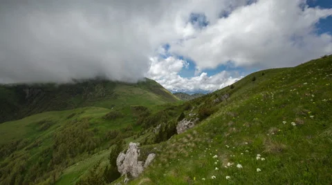 Movement of clouds over the summer slopes of Caucasus Mountains 스톡 동영상 67254017