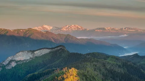 Movement of clouds over the summer slopes of Caucasus Mountains Stock-Footage 67254378