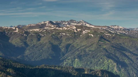 Movement of clouds over the summer slopes of Caucasus Mountains 스톡 동영상 67266869