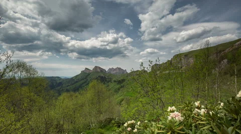 Movement of clouds over the summer slopes of Caucasus Mountains Video stock 67276183