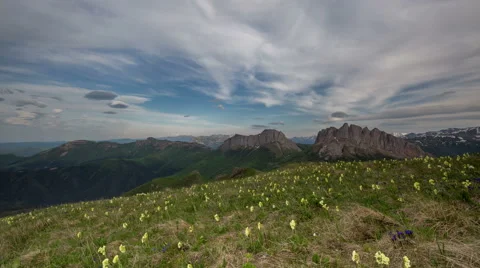 Movement of clouds over the summer slopes of Caucasus Mountains Stock-Footage 67280483