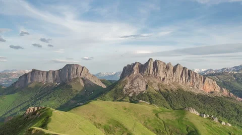 Movement of clouds over the summer slopes of Caucasus Mountains Stock-Footage 67281944