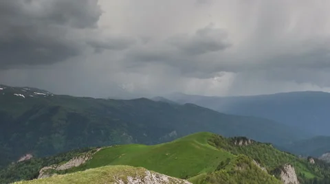 Movement of clouds over the summer slopes of Caucasus Mountains 스톡 동영상 67307610