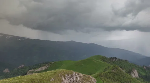 Movement of clouds over the summer slopes of Caucasus Mountains Vídeo Stock 67307840