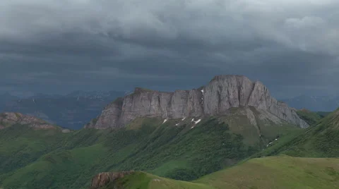 Movement of clouds over the summer slopes of Caucasus Mountains Stock Footage 67329166