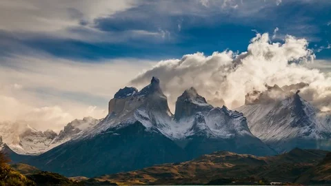 The movement of clouds over the towers of Cuernos. Parque Torres del Paine Stock Footage 75631063
