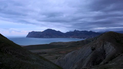 Movement of clouds over the volcano Karadag, Koktebel Bay in Crimea Stock Footage 155210282