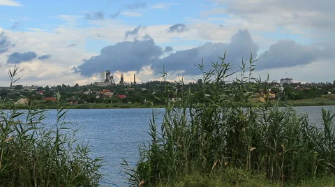 Movement of clouds on the river Kalmius. Donetsk, Full HD Stock Footage 65774702