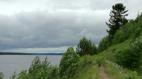 Movement of clouds on the river Kama. Cape Strelka, Gorodishche Village,  Stock Footage 56993105
