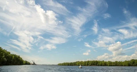 Movement of clouds on the river, in summer, time lapses Stock Footage 85452938