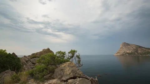 The movement of clouds in the spring in the Crimea peninsula Stock Footage 144054690
