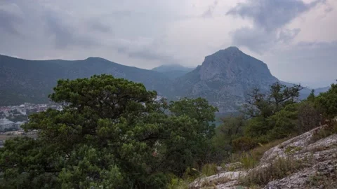 The movement of clouds in the spring in the Crimea peninsula Stock Footage 144054731