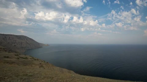 The movement of clouds in the spring in the Crimea peninsula Stock Footage 144054920