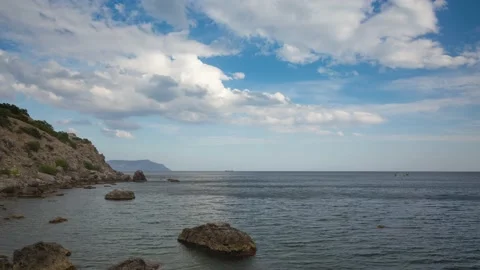 The movement of clouds in the spring in the Crimea peninsula Stock Footage 144055082