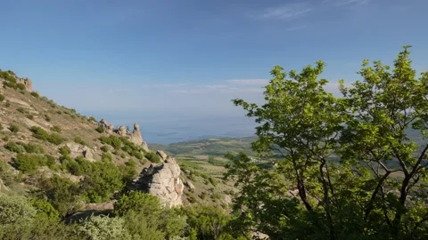 The movement of clouds in the spring in the Crimea peninsula Stock Footage 145389126